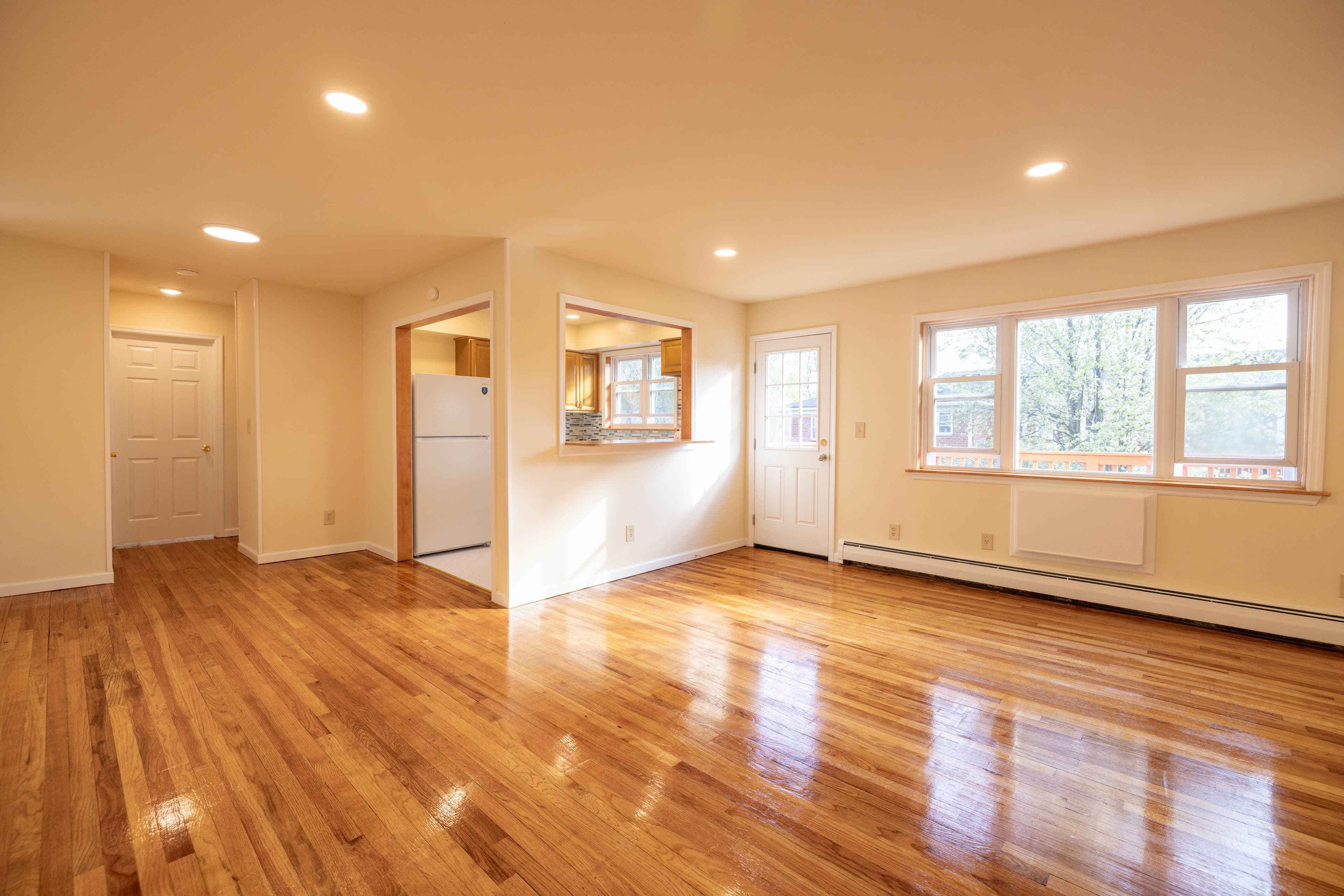Spacious living room with hardwood floors